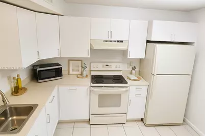 9001 Wiles Rd #103-3, Coral Springs, FL 33067 - Photo 7
