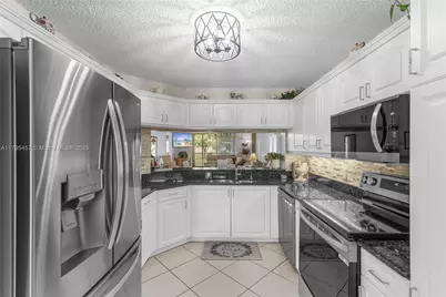 2541 N Nob Hill Rd #205, Sunrise, FL 33322 - Photo 1