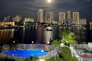 450 Golden Isles Dr, Hallandale Beach, FL 33009 - Photo 1