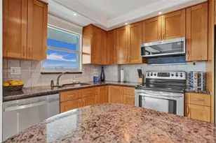 137 Golden Isles Dr, Hallandale Beach, FL 33009 - Photo 1