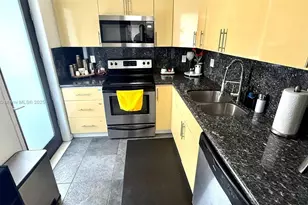 301 Golden Isles Dr, Hallandale Beach, FL 33009 - Photo 11