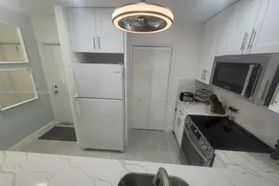 300 Golden Isles Dr, Hallandale Beach, FL 33009 - Photo 1