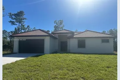 2002 E 13th St, Lehigh Acres, FL 33972 - Photo 1