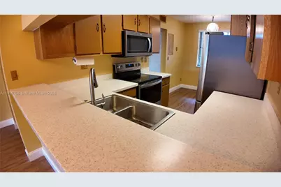 9577 W McNab Rd #110, Tamarac, FL 33321 - Photo 11