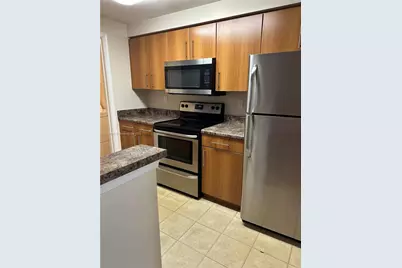 5840 W Sample Rd #306, Coral Springs, FL 33067 - Photo 3