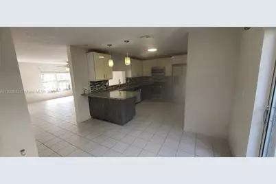 3937 NW 122nd Ter, Sunrise, FL 33323 - Photo 9