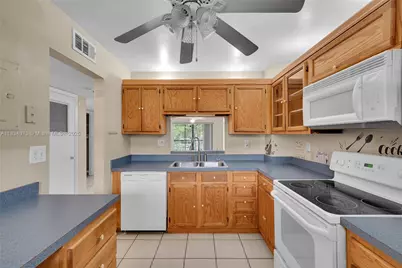 1100 NW 87th Ave #306, Coral Springs, FL 33071 - Photo 7