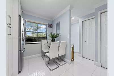 10942 W Sample Rd #E1, Coral Springs, FL 33065 - Photo 13