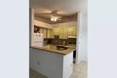 10407 E Clairmont Cir #210, Tamarac, FL 33321 - Photo 1