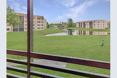 10402 Sunrise Lakes Blvd #201, Sunrise, FL 33322 - Photo 1