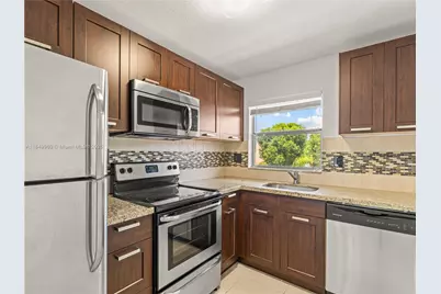 9460 Sunrise Lakes Blvd #309, Sunrise, FL 33322 - Photo 1