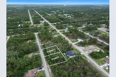 723 Alamo St E, Lehigh Acres, FL 33974 - Photo 5