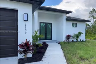 1137 Damen St E, Lehigh Acres, FL 33974 - Photo 1