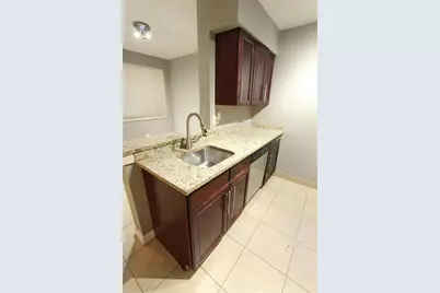 2850 N Oakland Forest Dr #107, Oakland Park, FL 33309 - Photo 5