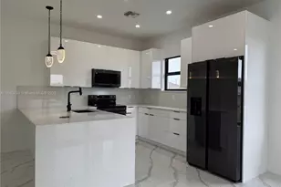 3109 9th St SW, Lehigh Acres, FL 33976 - Photo 5