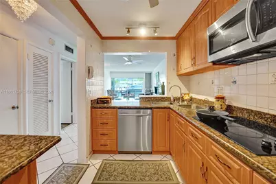 455 Paradise Isle Blvd #104, Hallandale Beach, FL 33009 - Photo 9