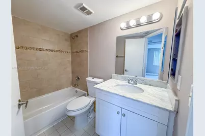 8781 Wiles Rd #108, Coral Springs, FL 33067 - Photo 13