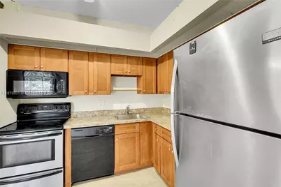 9644 S Belfort Cir #211, Tamarac, FL 33321 - Photo 5