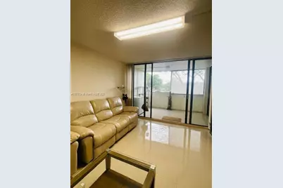 8441 Forest Hills Dr #204, Coral Springs, FL 33065 - Photo 1