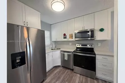 9001 Sunrise Lakes Blvd #308, Sunrise, FL 33322 - Photo 1