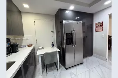 401 Golden Isles Dr #415, Hallandale Beach, FL 33009 - Photo 9