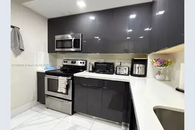 401 Golden Isles Dr #415, Hallandale Beach, FL 33009 - Photo 11