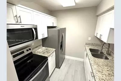 250 NW 107th Ave #202, Miami, FL 33172 - Photo 5