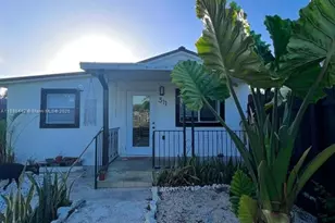 311 NW 32nd Ct, Miami, FL 33125 - Photo 1