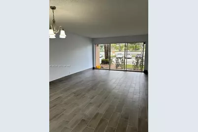 8701 Wiles Rd #103, Coral Springs, FL 33067 - Photo 3