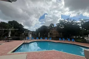 8701 Wiles Rd, Coral Springs, FL 33067 - Photo 11