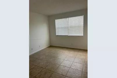 8821 Wiles Rd #306, Coral Springs, FL 33067 - Photo 9