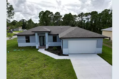 672 Nimitz Blvd, Lehigh Acres, FL 33974 - Photo 1