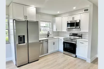 213 Oakridge  N #213, Deerfield Beach, FL 33442 - Photo 1