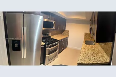 18101 NW 68th Ave #D207, Hialeah, FL 33015 - Photo 1