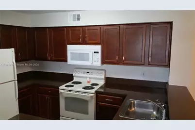 7640 Westwood Dr #407, Tamarac, FL 33321 - Photo 11