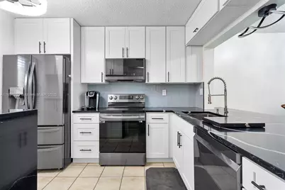 3050 NW 42nd Ave #C104, Coconut Creek, FL 33066 - Photo 1