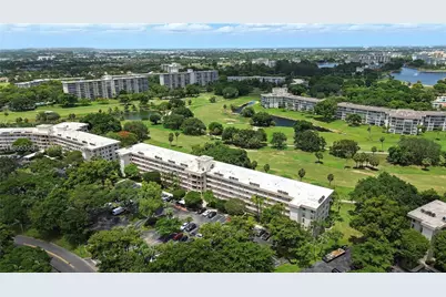 3850 Oaks Clubhouse Dr #307, Pompano Beach, FL 33069 - Photo 39