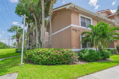 9033 Wiles Rd #303, Coral Springs, FL 33067 - Photo 1