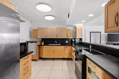 401 Golden Isles Dr #304, Hallandale Beach, FL 33009 - Photo 15