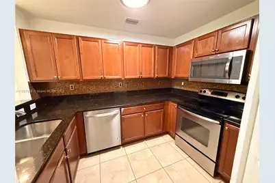 11605 NW 89th St #110, Doral, FL 33178 - Photo 7