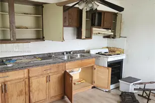 245 SW 11th Ave, South Bay, FL 33493 - Photo 7