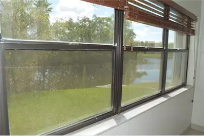 303 Racquet Club Rd #113, Weston, FL 33326 - Photo 11