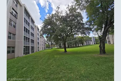 8735 Ramblewood Dr #413, Coral Springs, FL 33071 - Photo 29