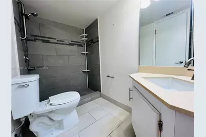 1351 NE 191st St #E211, Miami, FL 33179 - Photo 11