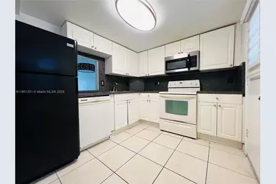 1351 NE 191st St #E211, Miami, FL 33179 - Photo 7