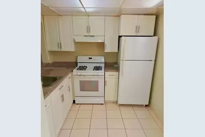 18051 NW 68th Ave #J102, Hialeah, FL 33015 - Photo 1