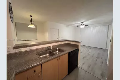 8010 N Nob Hill Rd #102, Tamarac, FL 33321 - Photo 9