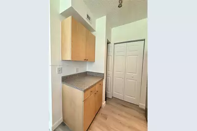 8010 N Nob Hill Rd #102, Tamarac, FL 33321 - Photo 11
