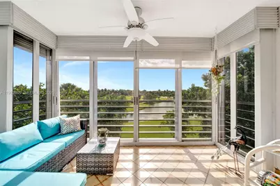 3980 Oaks Clubhouse Dr #409, Pompano Beach, FL 33069 - Photo 1