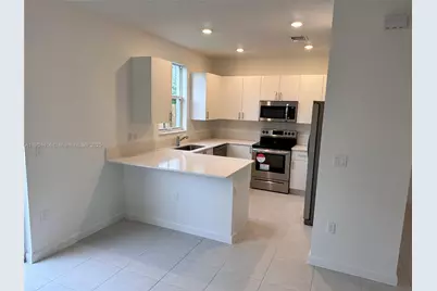 11884 NW 47th Mnr #11884, Coral Springs, FL 33076 - Photo 9